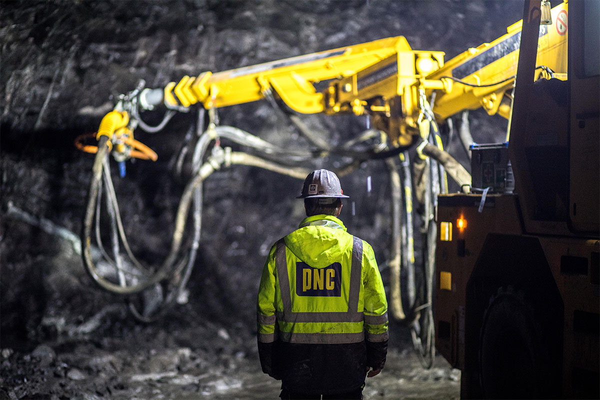 Employee working in a tunnel